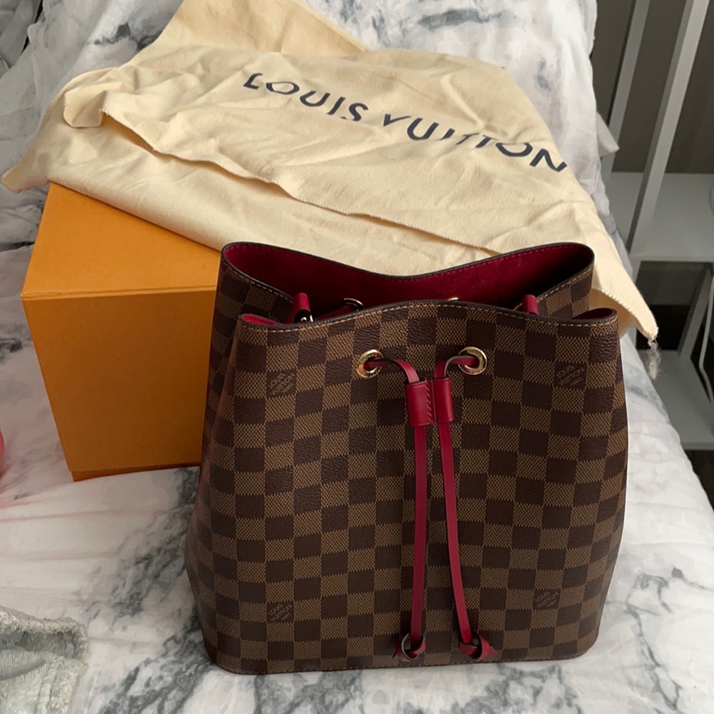 Selling NéoNoe Damier Eben with dark red interior.
